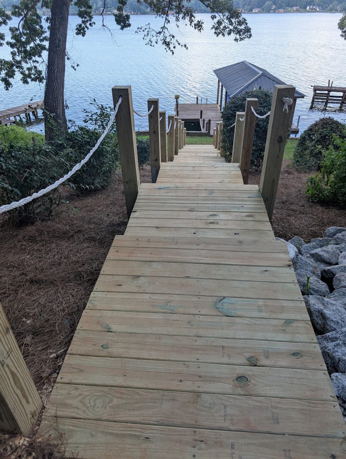 New wooden walkway and steps down to the dock